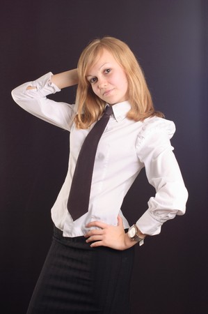 Young girl dressed as a business lady with a briefcaseの写真素材