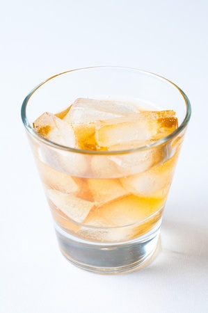 A glass of cold drink with iceの写真素材