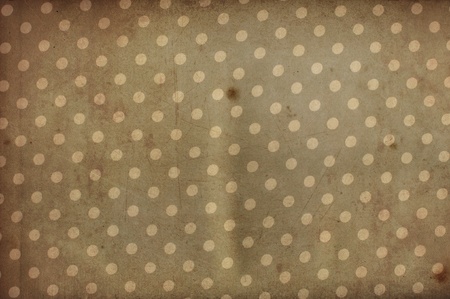 Vintage old fabric texture with polka dots stainedの写真素材