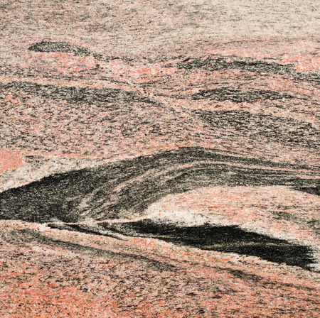 Texture of red and black granite, marble tiles.の写真素材
