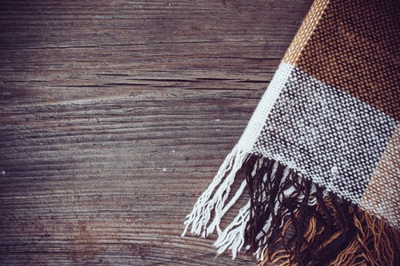 Brown plaid on old natural wooden boardの写真素材