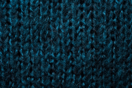 Teal knitted fabric macro shot, cloth texture