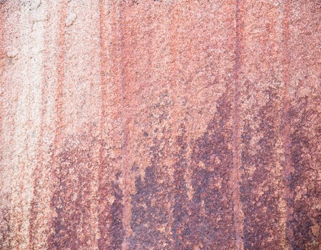 Texture of natural striped stone, pink color background, macro shotの写真素材