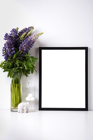 Modern home decor with frame and interior objects, design ready poster mock-upの写真素材