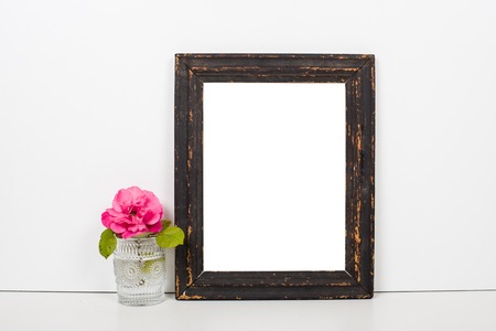 Beautiful empty old vintage art frame on white background, simple interior decor mock-up