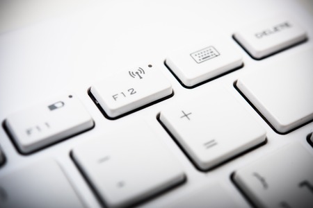 New computer keyboard with white keys, modern technology concept, macro shotの写真素材