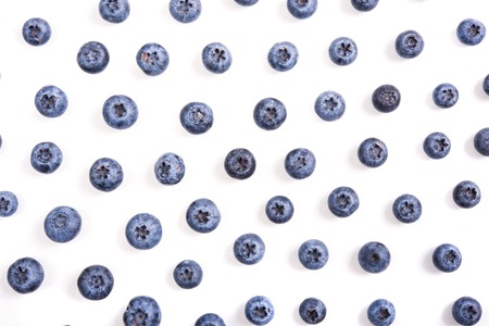 Fresh ripe blueberries isolated macro shot, fruit background, diet food pattern