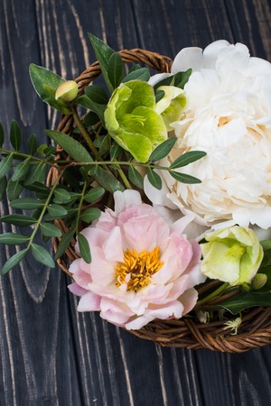 peony flowers arrangement on old wooden board background. Festivの写真素材