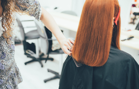 Stylist working in the beauty salon, haircut and hair stylingの写真素材