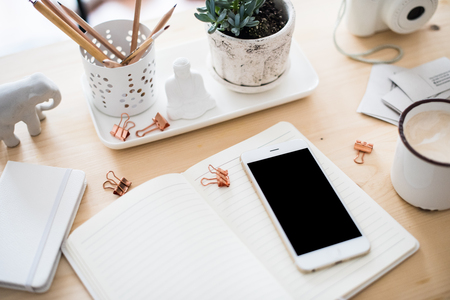 office desk flat lay with coffe, smartphone and succulents, stylの写真素材