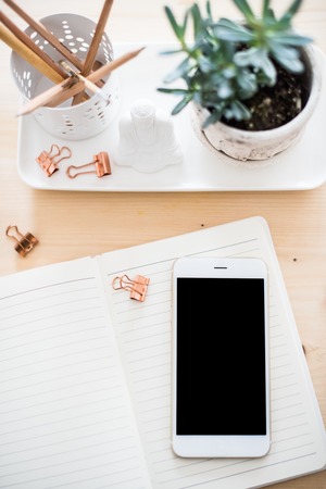 office desk flat lay with coffe, smartphone and succulents, stylの写真素材