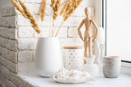 White real home decor, ceramic interior details with vases and candlesの写真素材