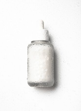 White glass cosmetic bottle mock-up with blank copy spaceの写真素材