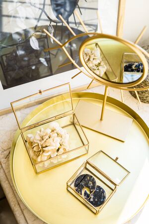 Luxurious home decoration in gold tones, real interior decor detailsの写真素材