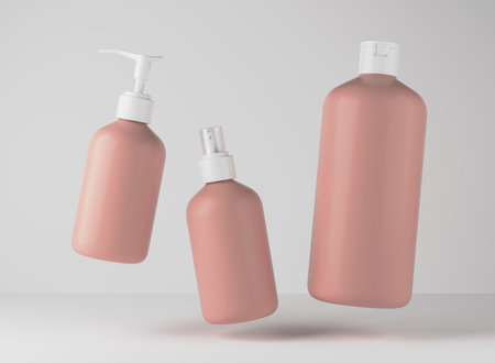 Three different brown plastic bottles for hair and body care products 3D render, set of floating cosmetic containers on gray studio background, packaging mockupの写真素材