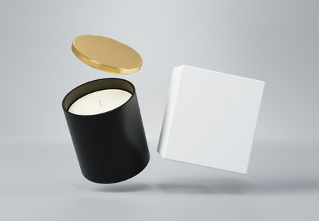Black ceramic glass jar candle with gold lid and box 3D render mockupの写真素材