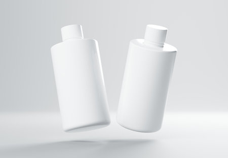 Two plastic shampoo bottles floating on gray background 3D render mockupの写真素材