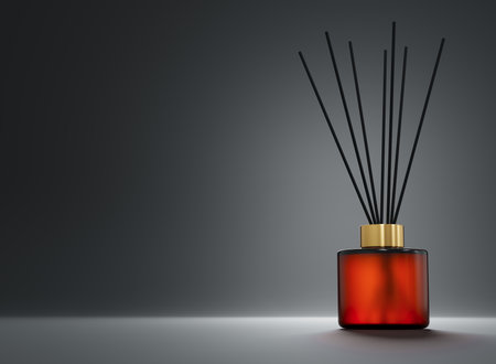 Aroma diffuser brown glass bottle with gold cap and sticks 3D renderの写真素材