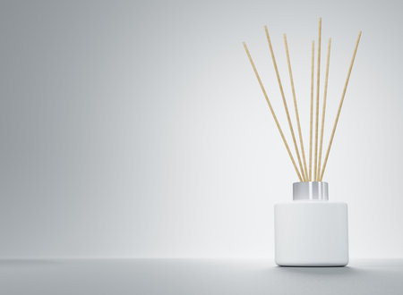 Aroma diffuser white bottle with silver cap and wooden sticks 3D renderの写真素材