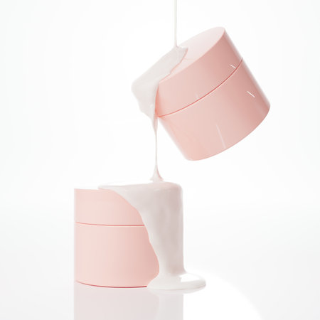 Two floating pink cosmetic jars and liquid cream flowing from above 3D render on white background iolatedの写真素材