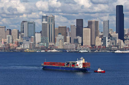 Seattle's skyline and barge, Washington, United Statesの写真素材
