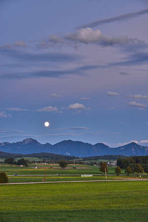 Moonrise in the bavarian alps. Moonrise in the mountains.の写真素材
