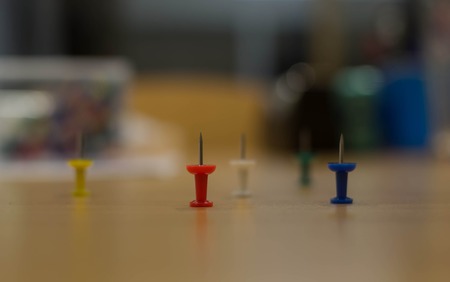 colored paper clips on the deskの写真素材