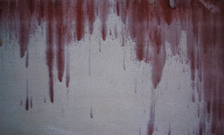 white wall bathed in red paint