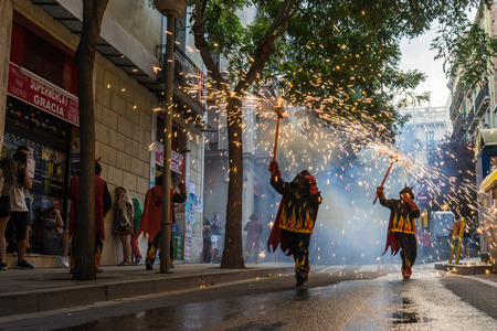 Barcelona,Spain Aug21: Fireworks in Gracia, Barcelona's district, during the traditional fire run.のeditorial素材