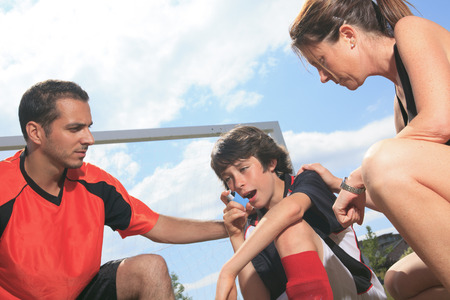 A picture of a boy who have an asthma crisis.の写真素材