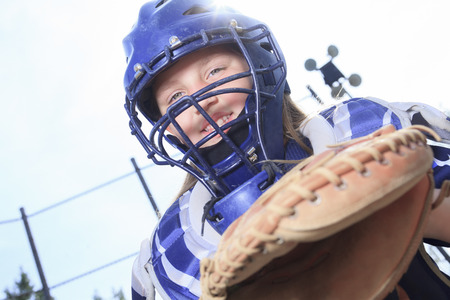 A baseball catcher at the sun lightの写真素材