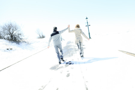 Portrait of happy senior couple in winter seasonの写真素材