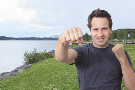 A portrait of an angry man who looks like he is up to start a fightの写真素材