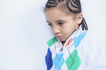 A Little african american boy, isolated on white backgroundの写真素材