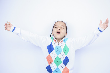 A Little african american boy, isolated on white backgroundの写真素材