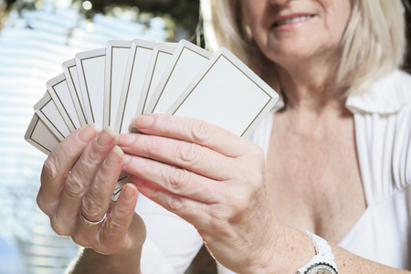 A Retired woman on the kitchen tableの写真素材