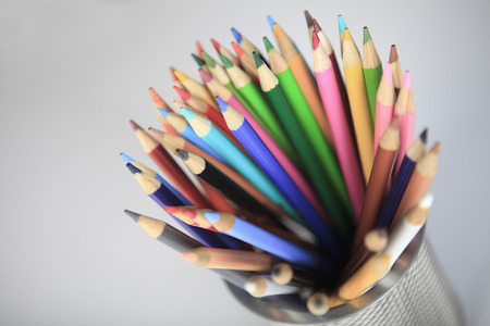 white background with colorfull pencils in studio