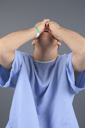 Portrait of young, lost, stressed, going nuts, looking crazy.の写真素材