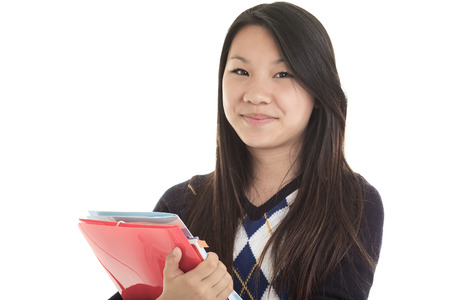 A beautiful Young Asian student isolated on white background.の写真素材