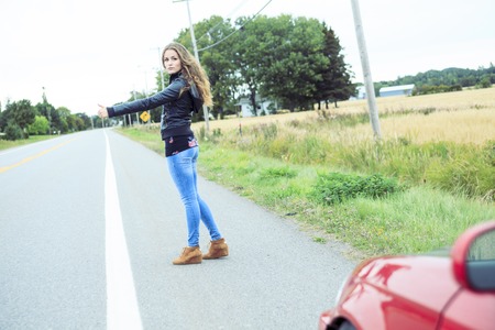 A Fashion woman outdoor with leather coatの写真素材