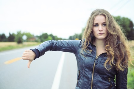 A Fashion woman outdoor with leather coatの写真素材