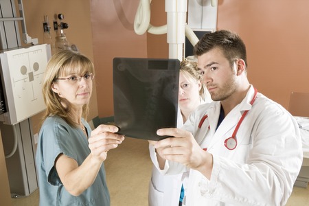 A Patient with doctor radiologist in a hospitalの写真素材