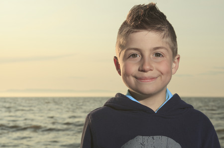 A Portrait of smiling, outdoors at sunset.の写真素材