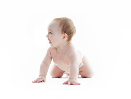 A sweet little boy in studio white backgroundの写真素材