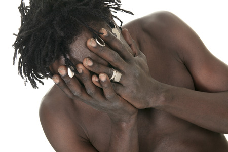 A sad african over a white backgroundの写真素材