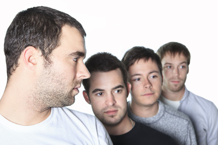 Mens friends in a rowの写真素材