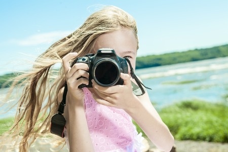 An Adorable little girl on beach vacationの写真素材