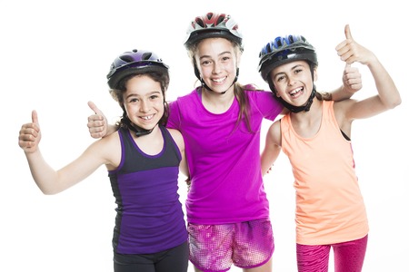 A portrait of girl on rollers skating isolated on white background