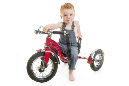 A redhead baby boy portrait over a isolated white backgroundの写真素材