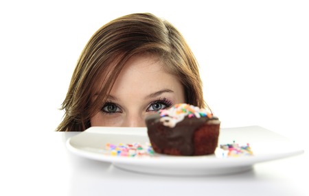 A teen who choose a cake for breakfestの写真素材